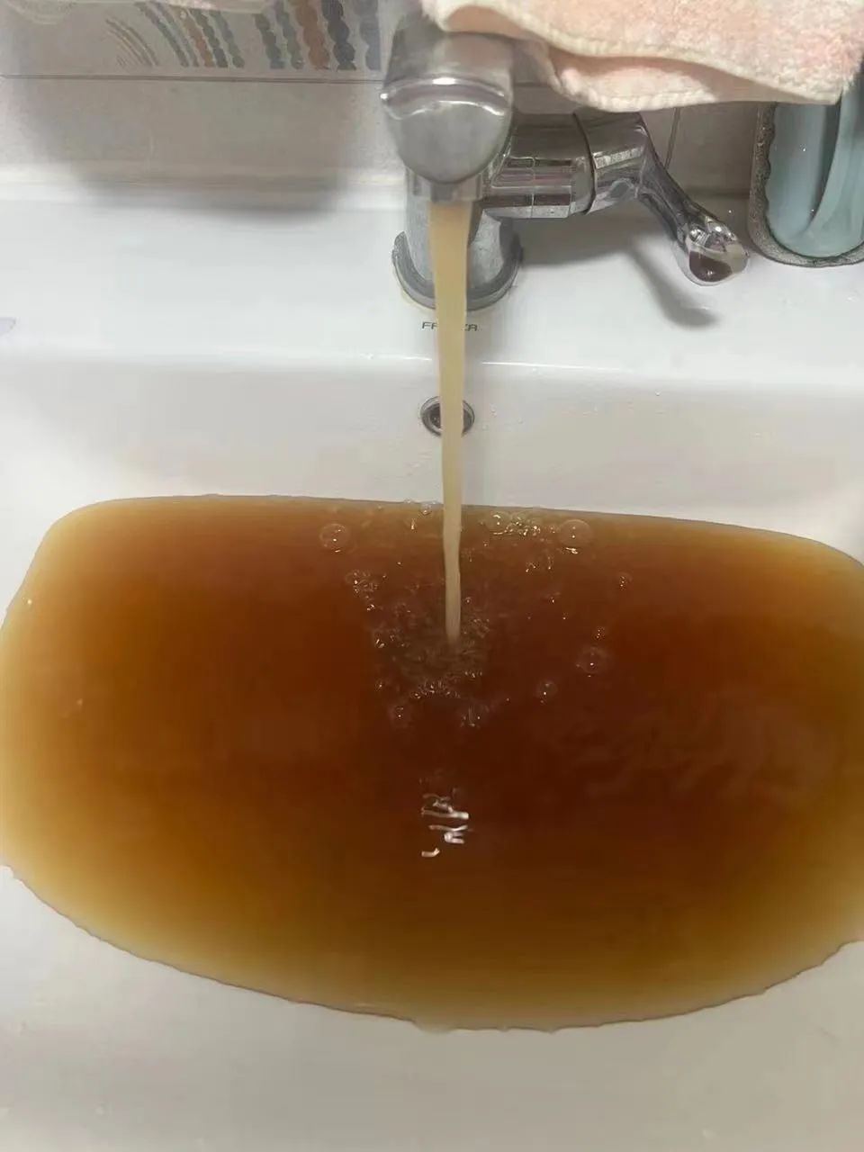 DƬ